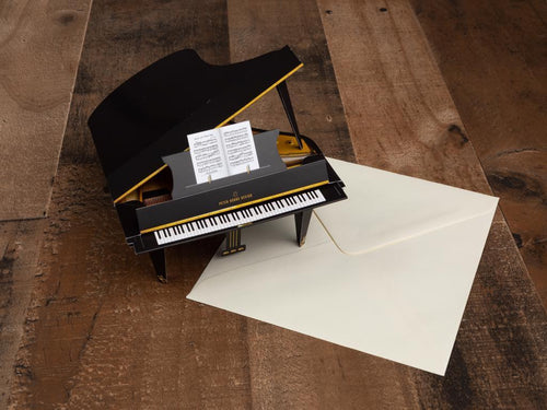 Grand Piano design. unique hand crafted grand piano can easily be assembled, individually wrapped and includes envelope. Made in England. Weight 0.10 lb