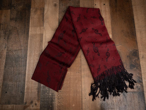 Classy all year ‘round with our elegant music themed pashminas. 70% pashmina fibers and 30% silk. 72 inches by 27 inches. Weight 0.50 lb. Color: Cabernet