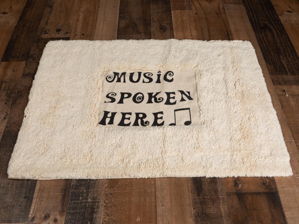 A harmonious entry piece, “Music Spoken Here” machine washable. 20 x 30 inches. Individually packaged. Weight is 3 lbs.