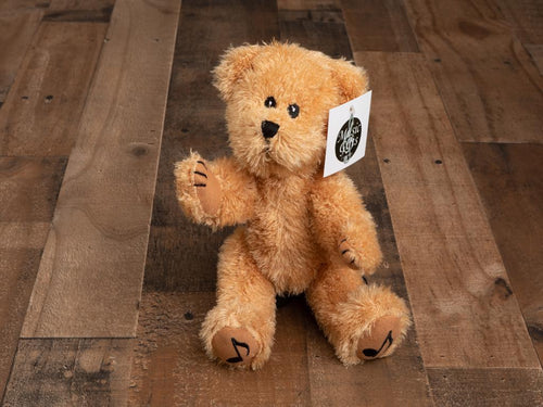 Give the magic of a warm embrace with this cuddly bear! 10 inches jointed. Weight .50 lb.