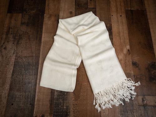 Classy all year ‘round with our elegant music themed pashminas. 70% pashmina fibers and 30% silk. 72 inches by 27 inches. Weight 0.50 lb Colors: White