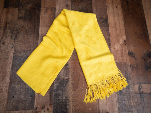 Classy all year ‘round with our elegant music themed pashminas. 70% pashmina fibers and 30% silk. 72 inches by 27 inches. Weight 0.50 lb Color: Yellow