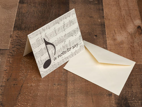 Embrace loved ones with a beautiful musical Note! 10 blank cards with 10 matching envelopes in a clear acrylic box. 4 inches x 6 inches x 2 inches.